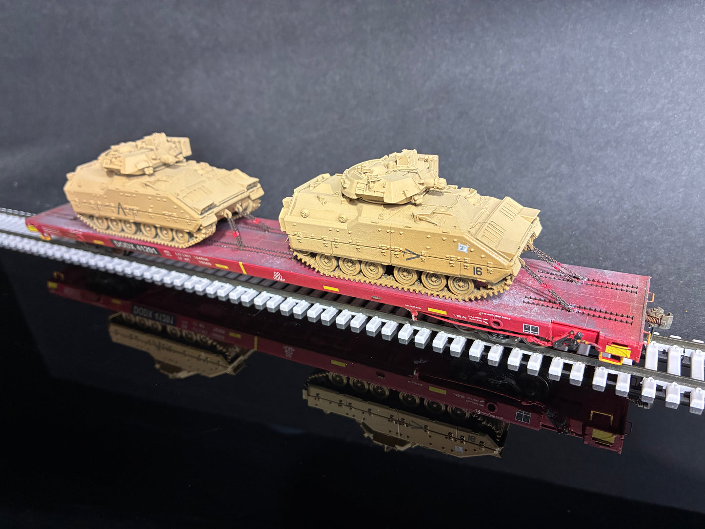 Protoloads HO Scale 68'DODX Flatcar with 2 Bradley Armored Vehicals