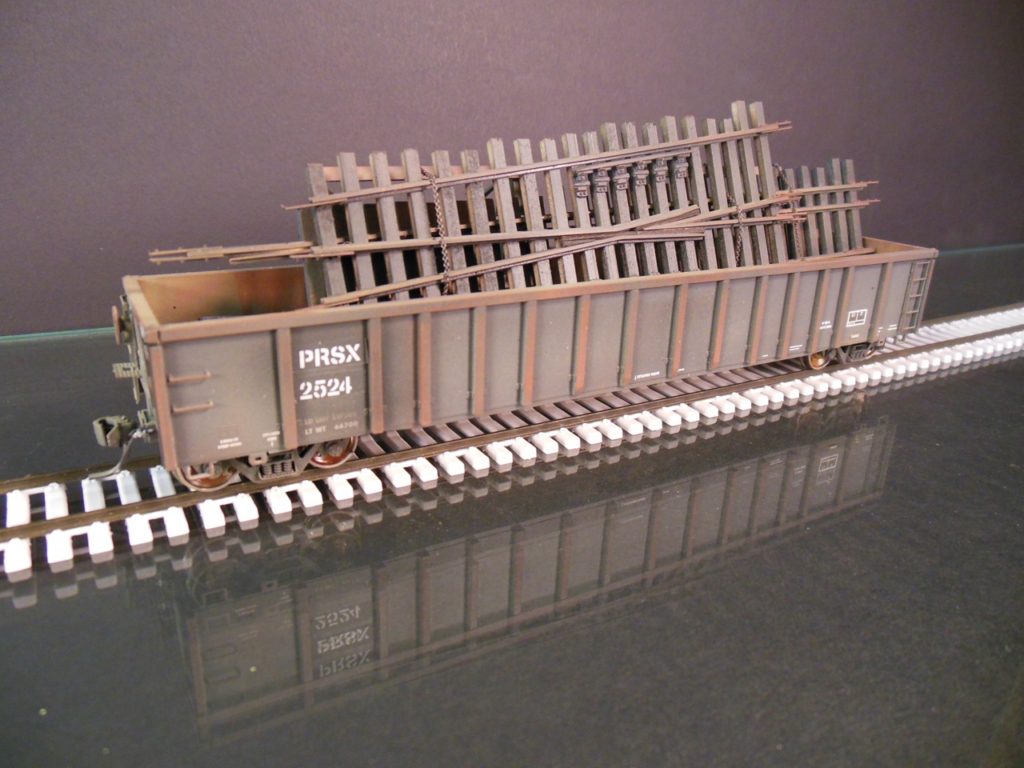 ExactRail HO scale gondola with coiled steel wire. Protoloads
