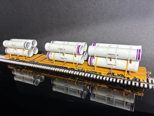 WalthersProto HO Scale 110 Ton Flatcar with Ductile Pipe