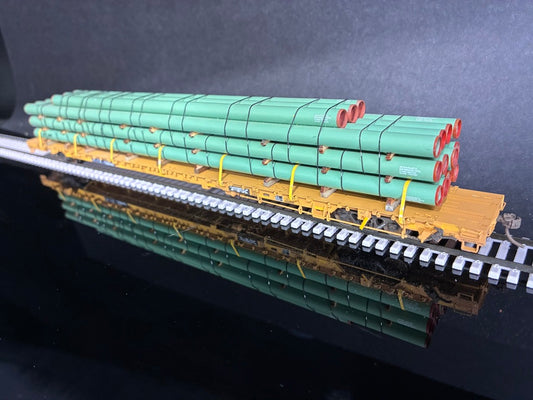 WalthersProto HO Scale 110 Ton Flatcar with Line Pipe