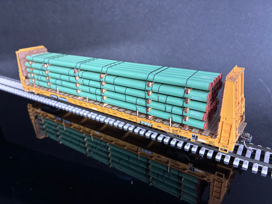 Atlas HO Scale 68' Bulkhead Flatcar with Steel Pipe