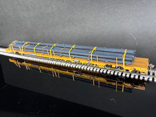 WalthersProto HO Scale 89’ 110 Ton Flatcar with Rebar.