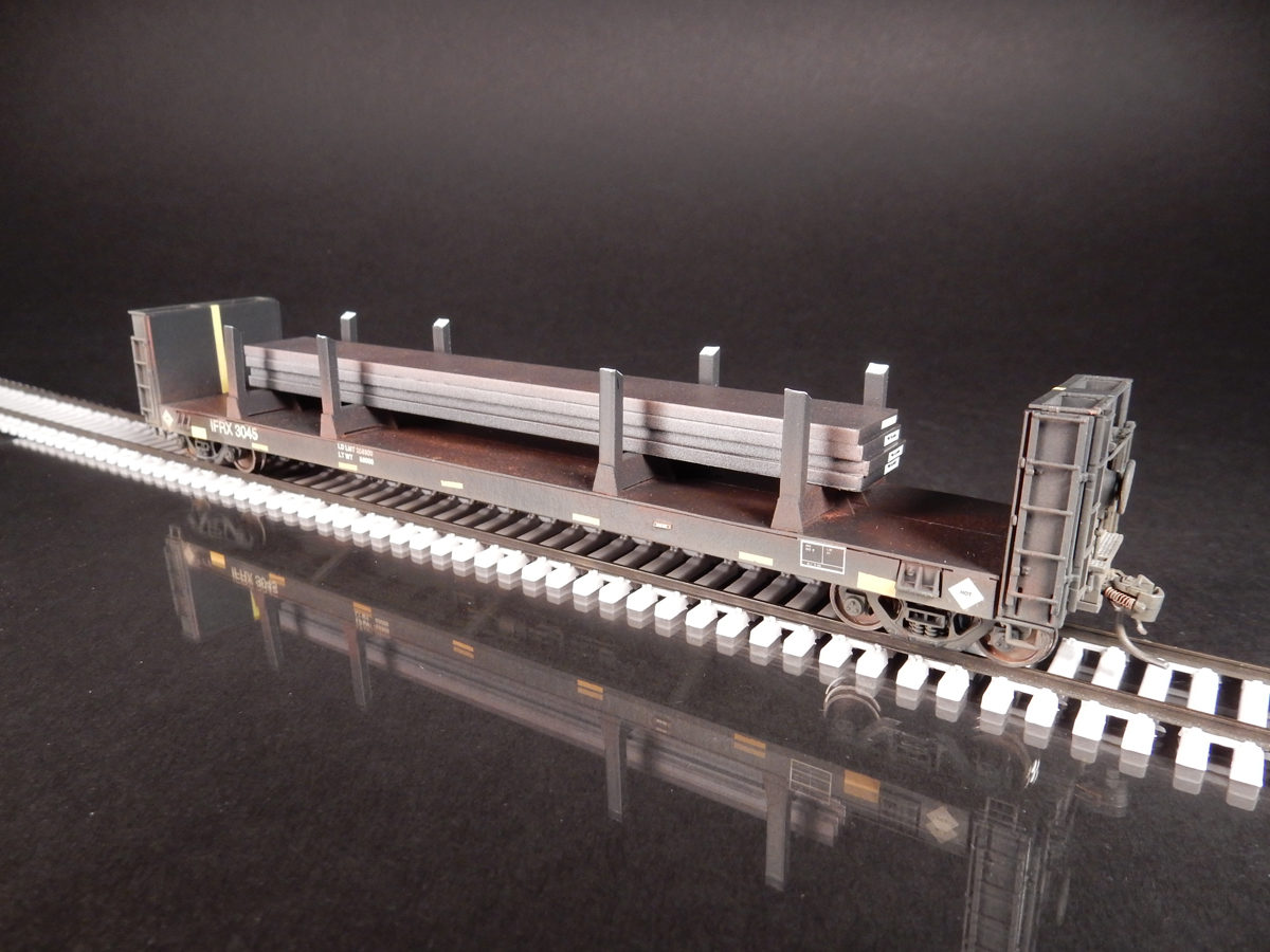 Modified Walther HO scale bulkheads flatcar with hot steel slabs